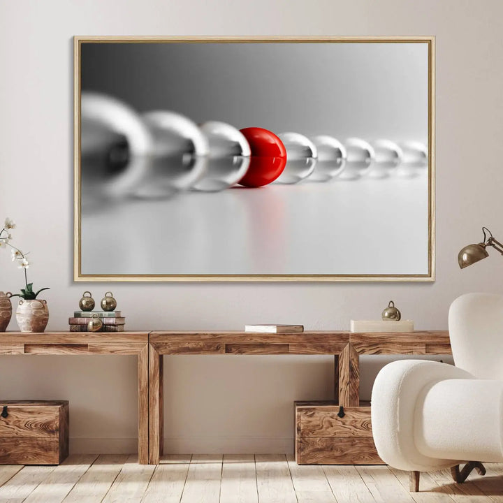 Displayed in a dining room, the Red Ball in Gray Balls canvas boasts a gallery-quality finish.