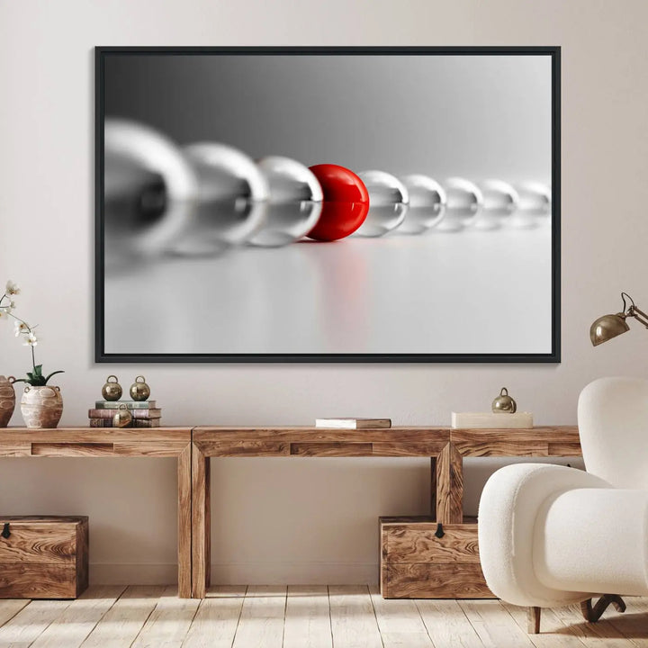 Displayed in a dining room, the Red Ball in Gray Balls canvas boasts a gallery-quality finish.