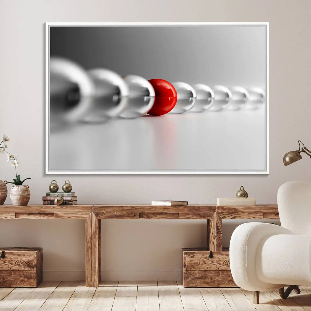 Displayed in a dining room, the Red Ball in Gray Balls canvas boasts a gallery-quality finish.