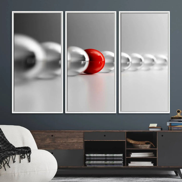 Displayed in a dining room, the Red Ball in Gray Balls canvas boasts a gallery-quality finish.