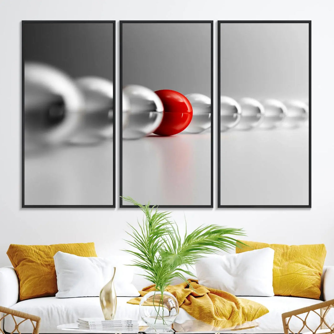 Displayed in a dining room, the Red Ball in Gray Balls canvas boasts a gallery-quality finish.