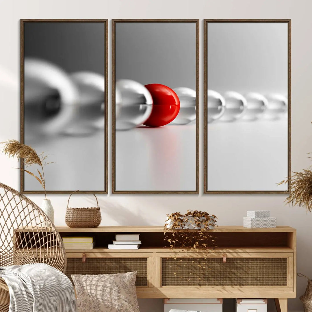 Displayed in a dining room, the Red Ball in Gray Balls canvas boasts a gallery-quality finish.