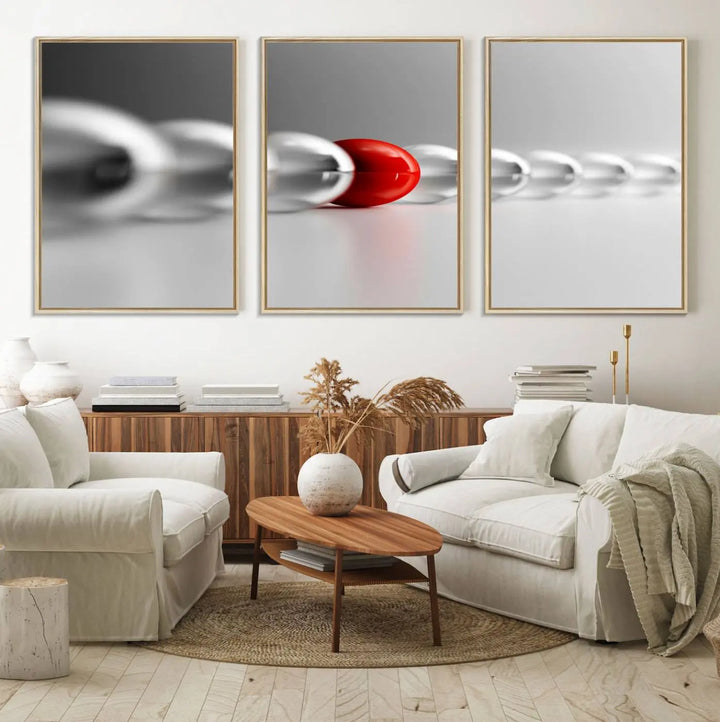 Displayed in a dining room, the Red Ball in Gray Balls canvas boasts a gallery-quality finish.