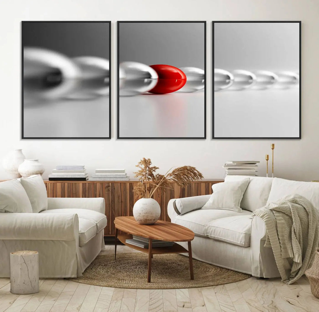 Displayed in a dining room, the Red Ball in Gray Balls canvas boasts a gallery-quality finish.