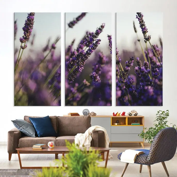 Displayed on the wall is a triptych of the Lavender Wall Art Floral Canvas Print, crafted with museum-quality materials and a UV-protective coating to maintain its vibrant elegance over time.