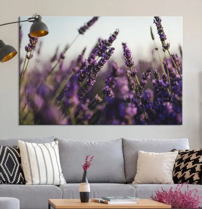 Displayed on the wall is a triptych of the Lavender Wall Art Floral Canvas Print, crafted with museum-quality materials and a UV-protective coating to maintain its vibrant elegance over time.