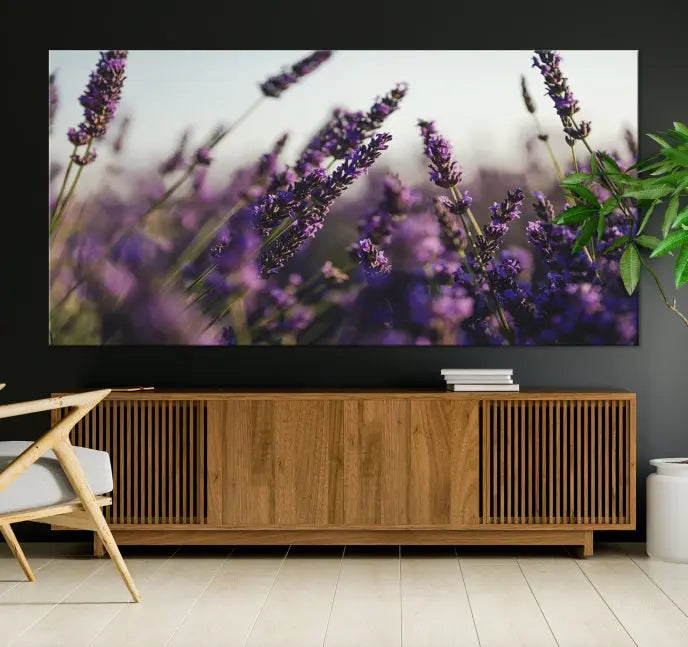 Displayed on the wall is a triptych of the Lavender Wall Art Floral Canvas Print, crafted with museum-quality materials and a UV-protective coating to maintain its vibrant elegance over time.