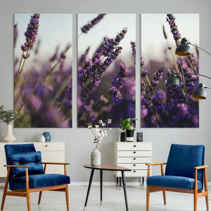 Displayed on the wall is a triptych of the Lavender Wall Art Floral Canvas Print, crafted with museum-quality materials and a UV-protective coating to maintain its vibrant elegance over time.