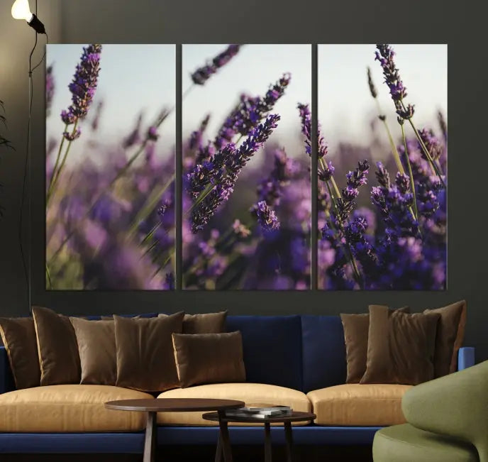 Displayed on the wall is a triptych of the Lavender Wall Art Floral Canvas Print, crafted with museum-quality materials and a UV-protective coating to maintain its vibrant elegance over time.