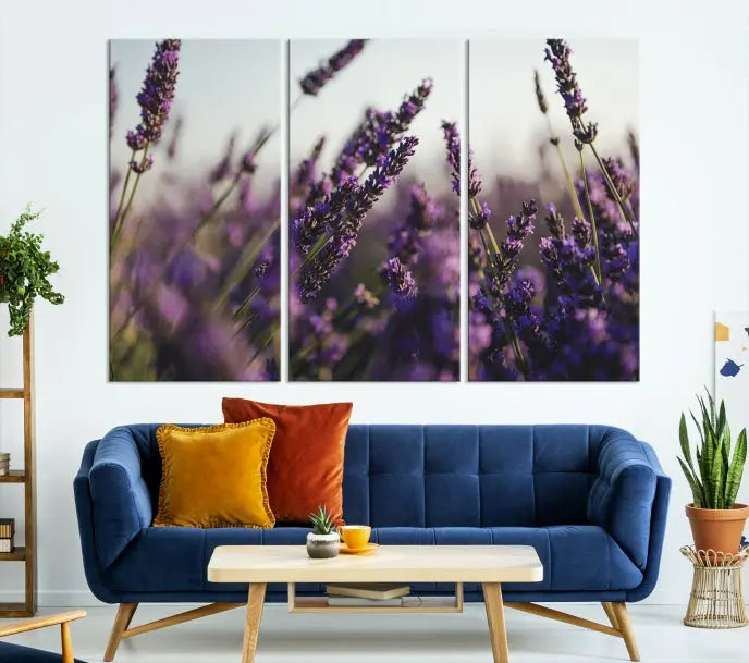 Displayed on the wall is a triptych of the Lavender Wall Art Floral Canvas Print, crafted with museum-quality materials and a UV-protective coating to maintain its vibrant elegance over time.