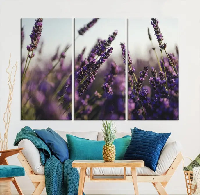 Displayed on the wall is a triptych of the Lavender Wall Art Floral Canvas Print, crafted with museum-quality materials and a UV-protective coating to maintain its vibrant elegance over time.