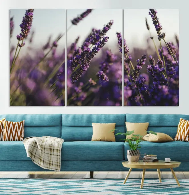 Displayed on the wall is a triptych of the Lavender Wall Art Floral Canvas Print, crafted with museum-quality materials and a UV-protective coating to maintain its vibrant elegance over time.