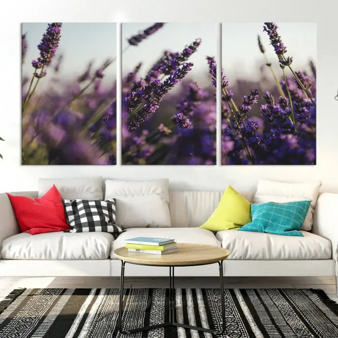 Displayed on the wall is a triptych of the Lavender Wall Art Floral Canvas Print, crafted with museum-quality materials and a UV-protective coating to maintain its vibrant elegance over time.