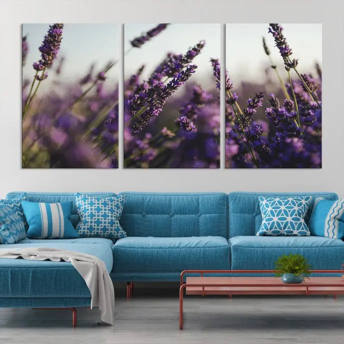 Displayed on the wall is a triptych of the Lavender Wall Art Floral Canvas Print, crafted with museum-quality materials and a UV-protective coating to maintain its vibrant elegance over time.