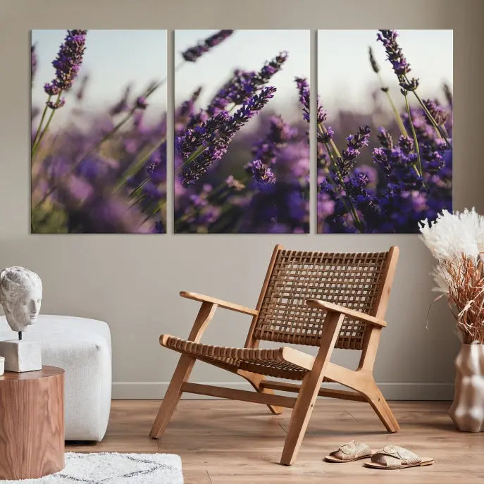 Displayed on the wall is a triptych of the Lavender Wall Art Floral Canvas Print, crafted with museum-quality materials and a UV-protective coating to maintain its vibrant elegance over time.