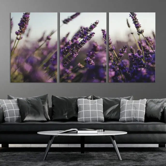 Displayed on the wall is a triptych of the Lavender Wall Art Floral Canvas Print, crafted with museum-quality materials and a UV-protective coating to maintain its vibrant elegance over time.