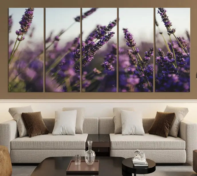 Displayed on the wall is a triptych of the Lavender Wall Art Floral Canvas Print, crafted with museum-quality materials and a UV-protective coating to maintain its vibrant elegance over time.