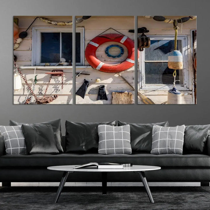 The living room features the Lifebuoy Wall Art Nautical Canvas Print, a museum-quality piece that showcases a lifebuoy alongside fishing gear. The artwork is ready to hang and includes a UV-protective coating to ensure lasting vibrancy.