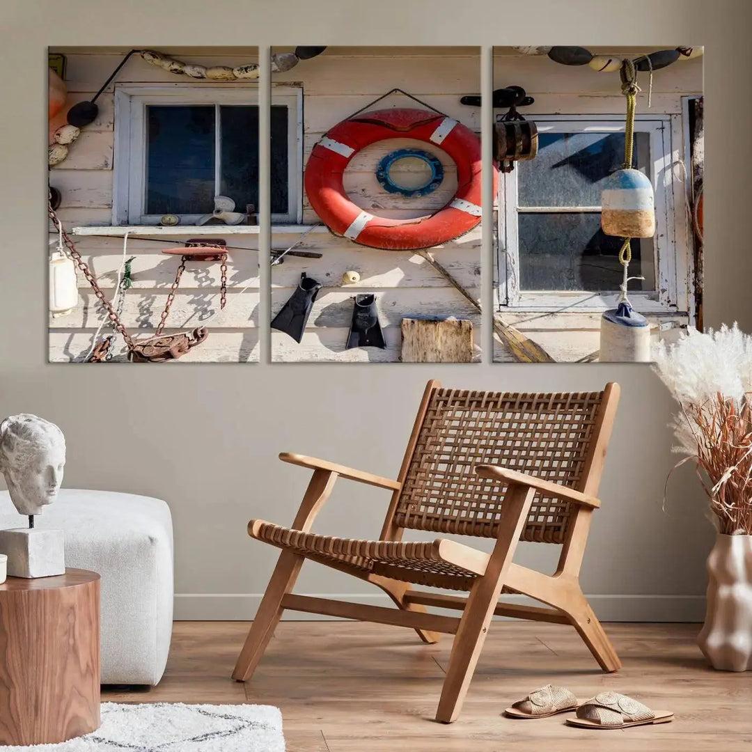 The living room features the Lifebuoy Wall Art Nautical Canvas Print, a museum-quality piece that showcases a lifebuoy alongside fishing gear. The artwork is ready to hang and includes a UV-protective coating to ensure lasting vibrancy.