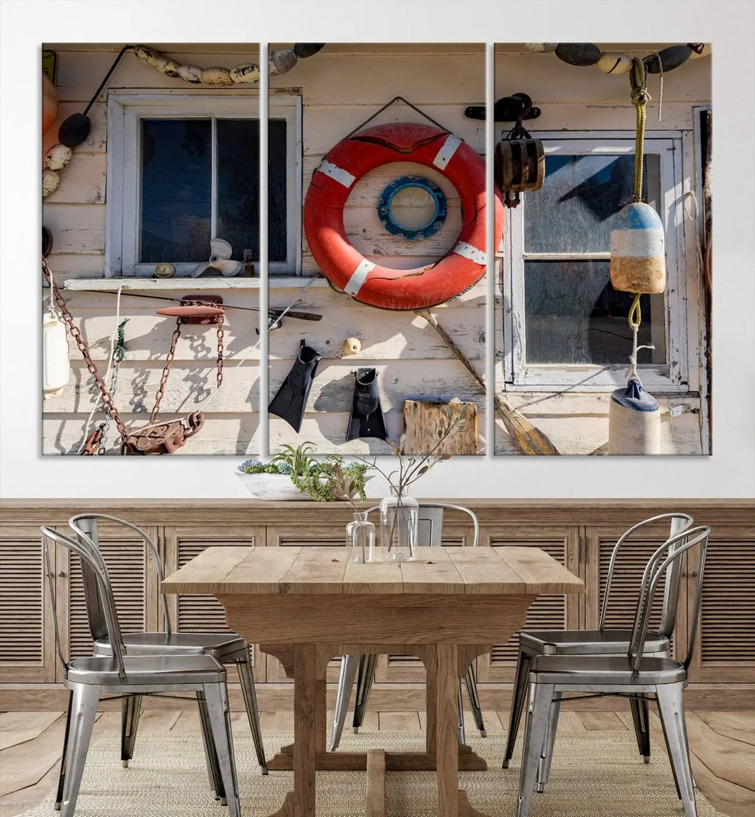 The living room features the Lifebuoy Wall Art Nautical Canvas Print, a museum-quality piece that showcases a lifebuoy alongside fishing gear. The artwork is ready to hang and includes a UV-protective coating to ensure lasting vibrancy.