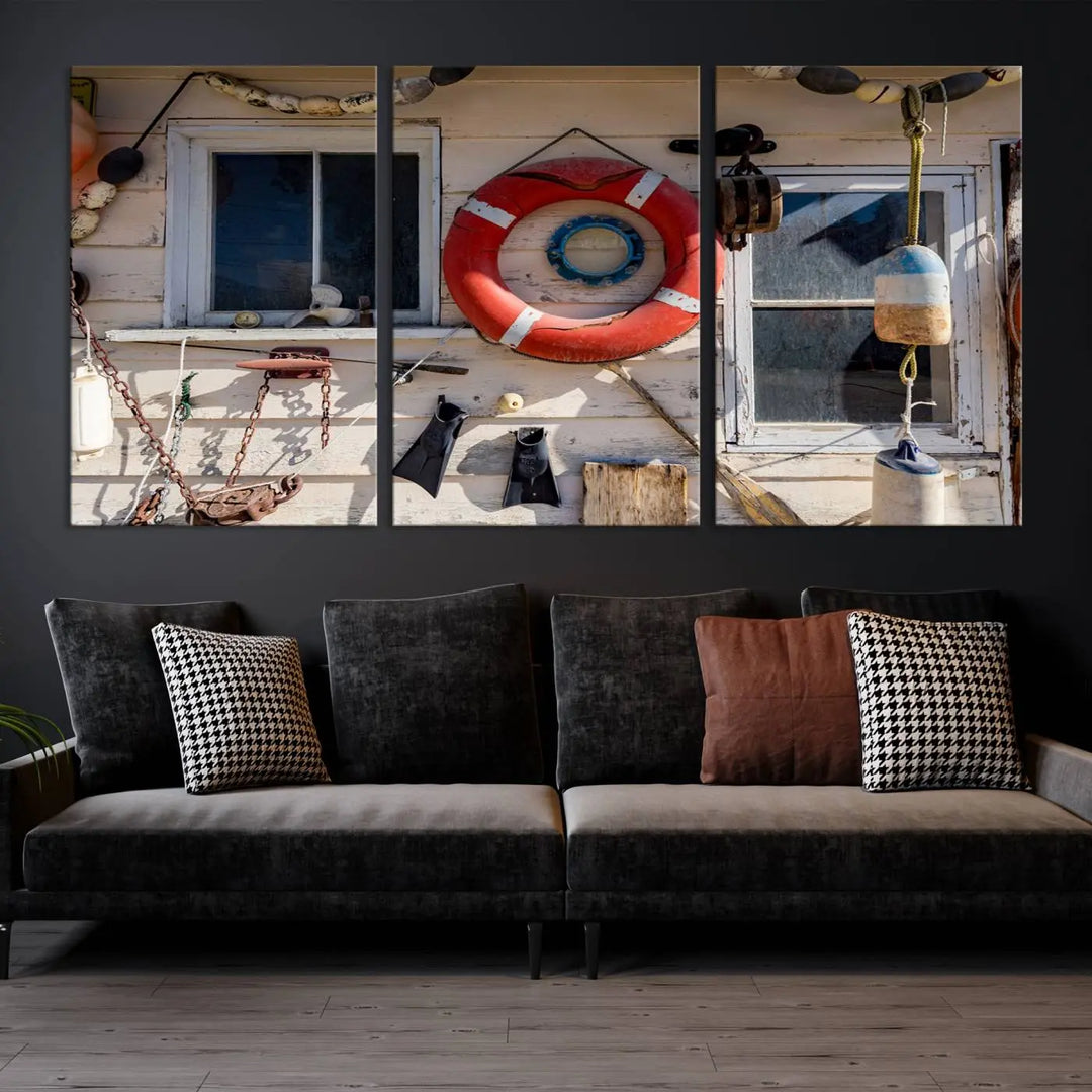 The living room features the Lifebuoy Wall Art Nautical Canvas Print, a museum-quality piece that showcases a lifebuoy alongside fishing gear. The artwork is ready to hang and includes a UV-protective coating to ensure lasting vibrancy.