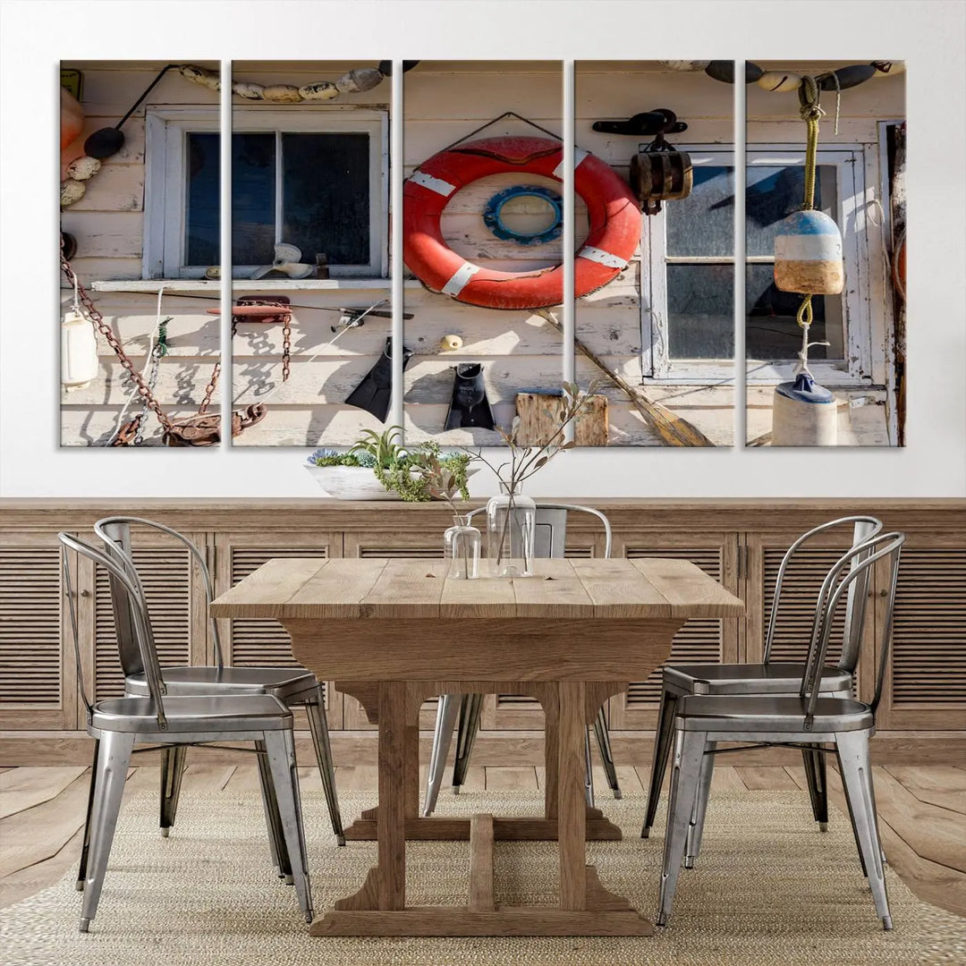 The living room features the Lifebuoy Wall Art Nautical Canvas Print, a museum-quality piece that showcases a lifebuoy alongside fishing gear. The artwork is ready to hang and includes a UV-protective coating to ensure lasting vibrancy.