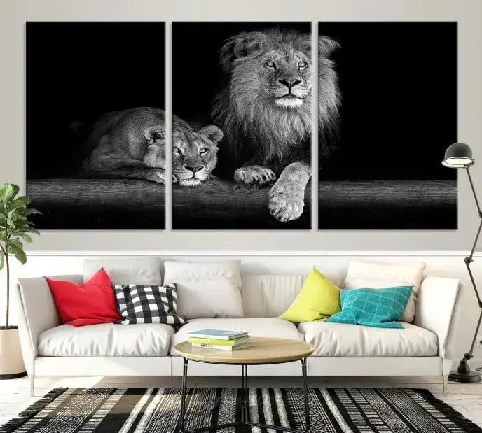 The vibrant 'Lion Family Wall Art Canvas Print' on the wall is a captivating artwork made with museum-quality polycotton and a UV-protective coating. It arrives ready to hang, adding an elegant touch to your space.