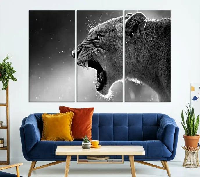 A Lion Wall Art Canvas Print depicting a roaring lioness in black and white, expertly gallery wrapped with UV-protective coating, is displayed in the living room.