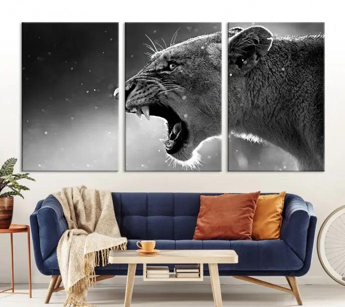 A Lion Wall Art Canvas Print depicting a roaring lioness in black and white, expertly gallery wrapped with UV-protective coating, is displayed in the living room.