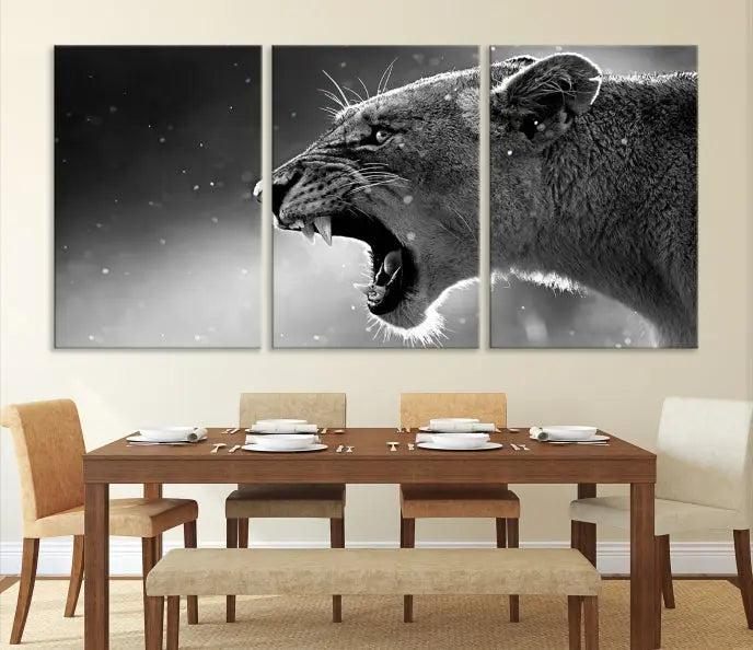 A Lion Wall Art Canvas Print depicting a roaring lioness in black and white, expertly gallery wrapped with UV-protective coating, is displayed in the living room.