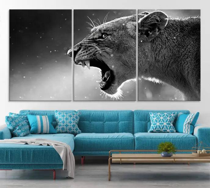 A Lion Wall Art Canvas Print depicting a roaring lioness in black and white, expertly gallery wrapped with UV-protective coating, is displayed in the living room.