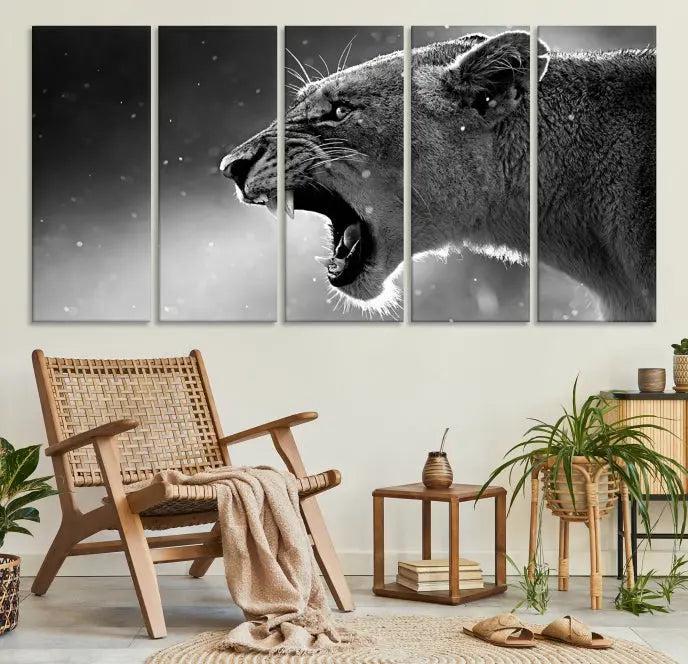 A Lion Wall Art Canvas Print depicting a roaring lioness in black and white, expertly gallery wrapped with UV-protective coating, is displayed in the living room.