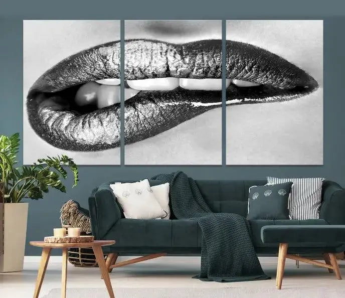 A striking triptych of Lip Bite Wall Art Canvas Print, featuring glossy metallic lips, gleams against a black background. Its UV-protective coating guarantees enduring vibrancy.