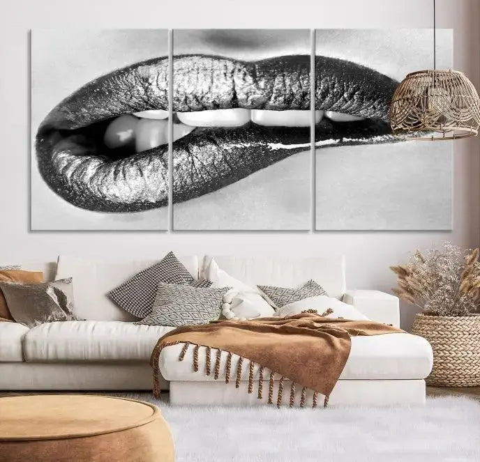 A striking triptych of Lip Bite Wall Art Canvas Print, featuring glossy metallic lips, gleams against a black background. Its UV-protective coating guarantees enduring vibrancy.