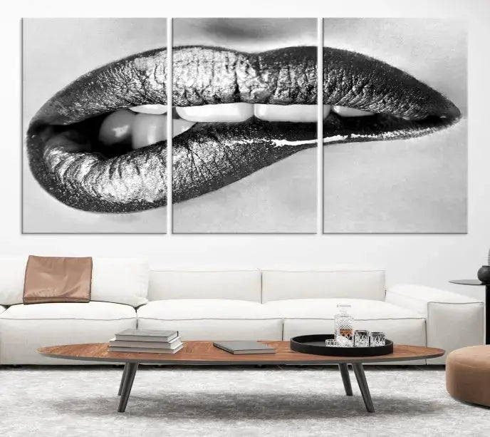 A striking triptych of Lip Bite Wall Art Canvas Print, featuring glossy metallic lips, gleams against a black background. Its UV-protective coating guarantees enduring vibrancy.