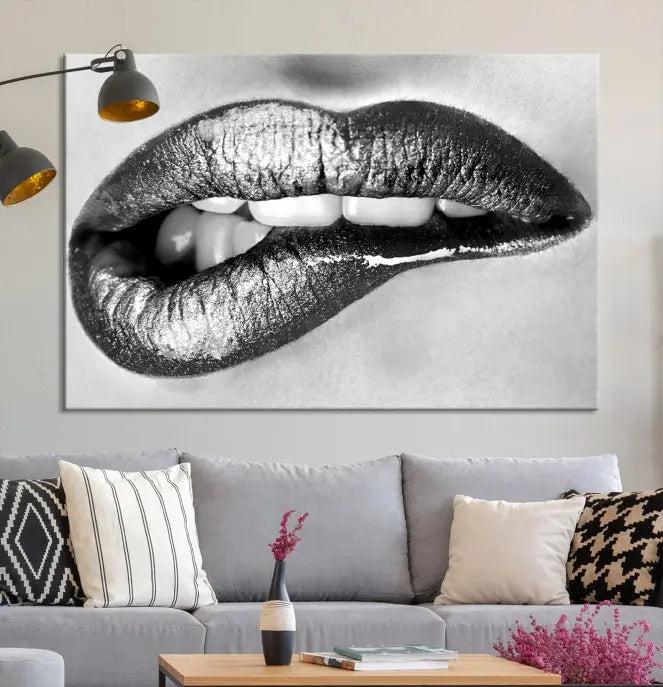 A striking triptych of Lip Bite Wall Art Canvas Print, featuring glossy metallic lips, gleams against a black background. Its UV-protective coating guarantees enduring vibrancy.