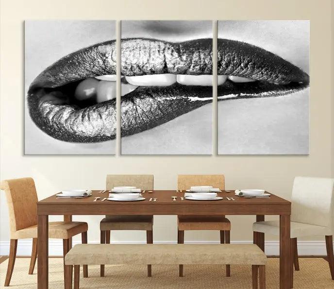 A striking triptych of Lip Bite Wall Art Canvas Print, featuring glossy metallic lips, gleams against a black background. Its UV-protective coating guarantees enduring vibrancy.