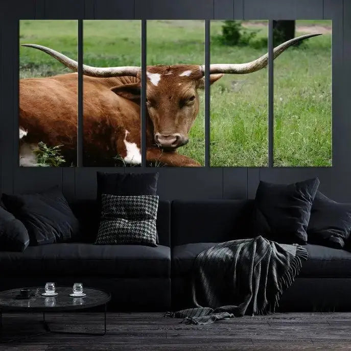 Longhorn steer triptych canvas wall art in a cozy living room setting.