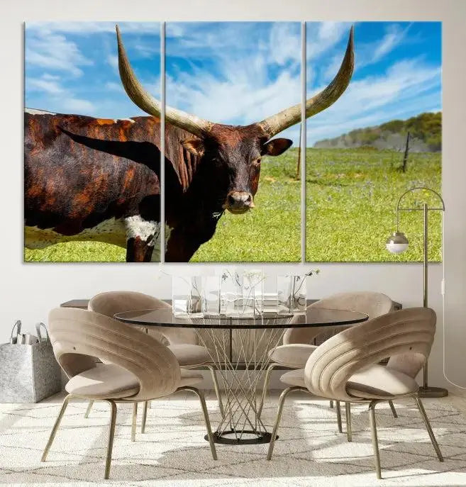 The Longhorn and Cow Wall Art Canvas Print features a triptych of a longhorn cow in a grassy field on a sunny day. These gallery-wrapped, museum-quality canvases are crafted by professional craftsmen to perfectly accentuate the scene, adding an exquisite touch to any living space.