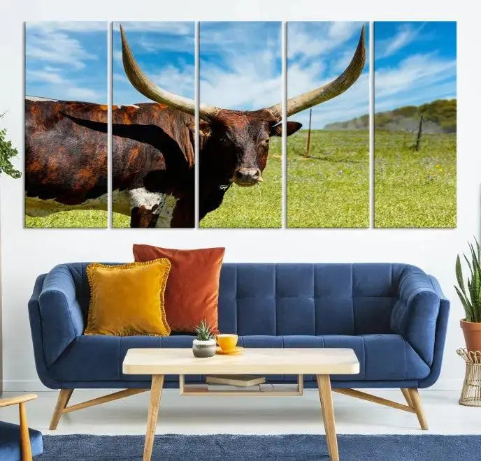 The Longhorn and Cow Wall Art Canvas Print features a triptych of a longhorn cow in a grassy field on a sunny day. These gallery-wrapped, museum-quality canvases are crafted by professional craftsmen to perfectly accentuate the scene, adding an exquisite touch to any living space.