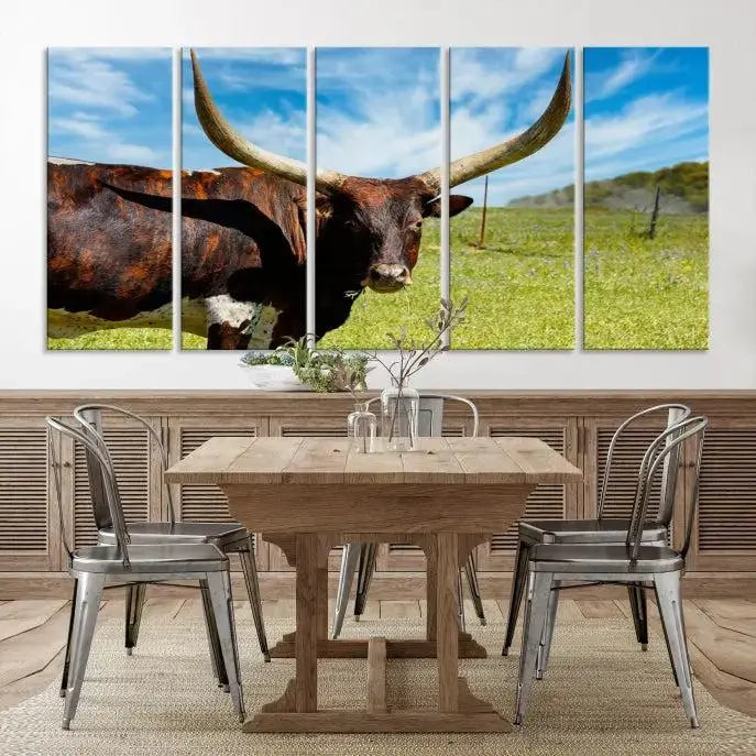 The Longhorn and Cow Wall Art Canvas Print features a triptych of a longhorn cow in a grassy field on a sunny day. These gallery-wrapped, museum-quality canvases are crafted by professional craftsmen to perfectly accentuate the scene, adding an exquisite touch to any living space.