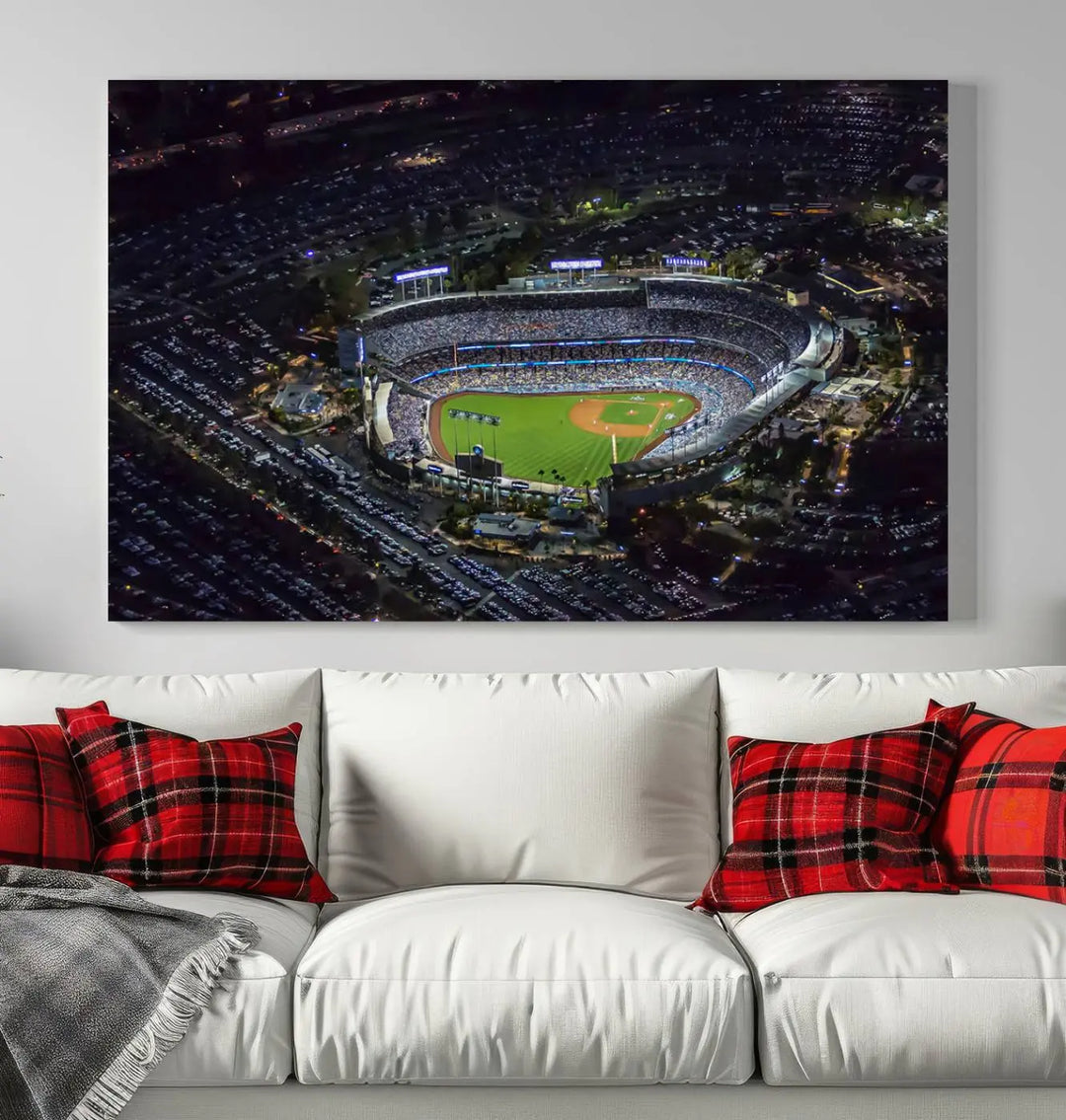 Immerse yourself in the Los Angeles Dodgers Baseball Team Print, featuring Dodger Stadium illuminated at night. This stunning piece is crafted on museum-quality canvas with a UV-protective coating, showcasing the stadium and its surrounding parking lot. Enjoy free shipping with your purchase.