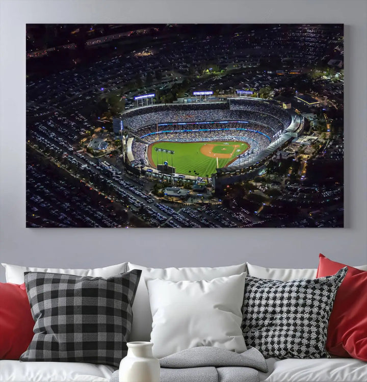 Immerse yourself in the Los Angeles Dodgers Baseball Team Print, featuring Dodger Stadium illuminated at night. This stunning piece is crafted on museum-quality canvas with a UV-protective coating, showcasing the stadium and its surrounding parking lot. Enjoy free shipping with your purchase.