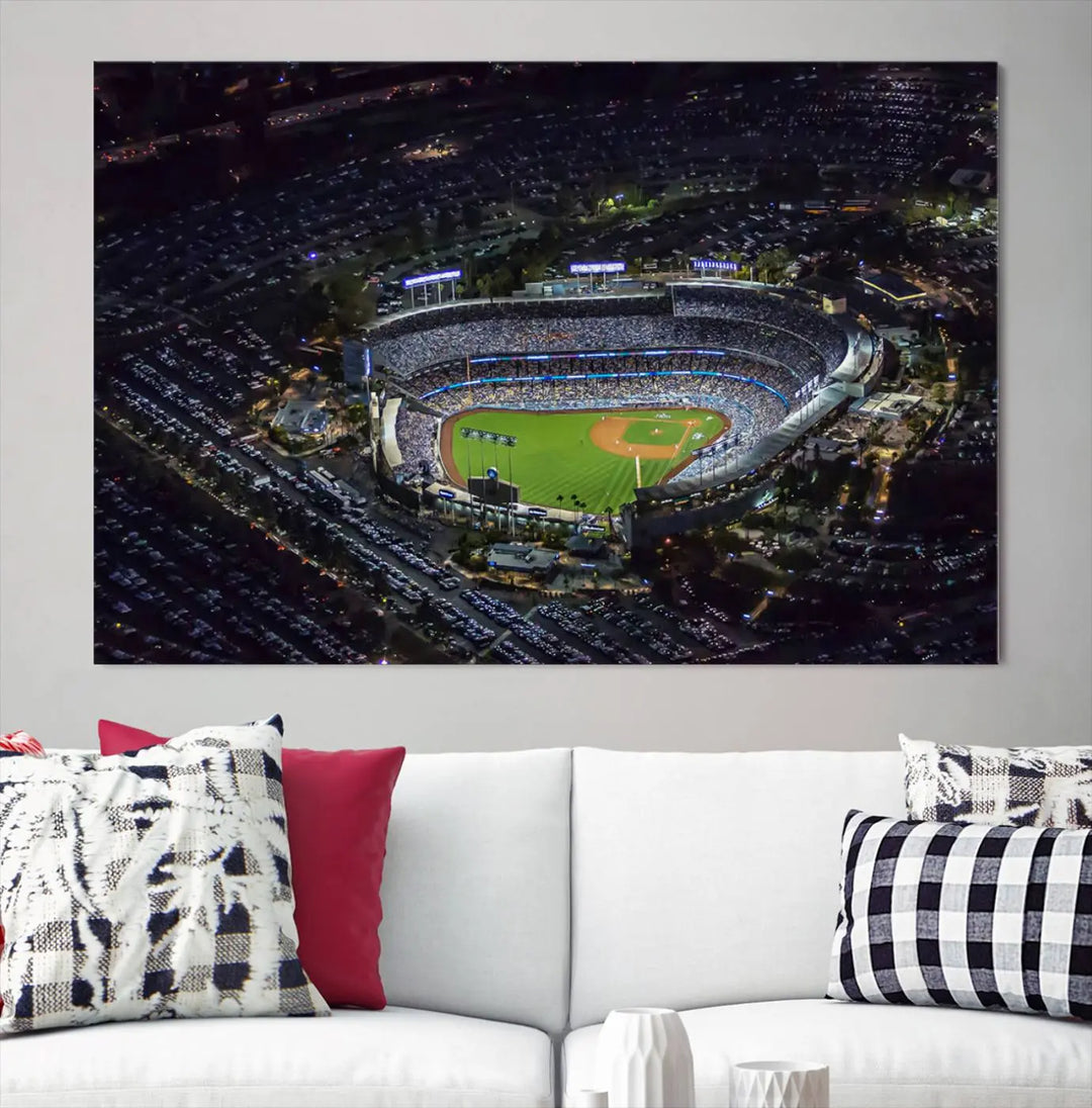 Immerse yourself in the Los Angeles Dodgers Baseball Team Print, featuring Dodger Stadium illuminated at night. This stunning piece is crafted on museum-quality canvas with a UV-protective coating, showcasing the stadium and its surrounding parking lot. Enjoy free shipping with your purchase.