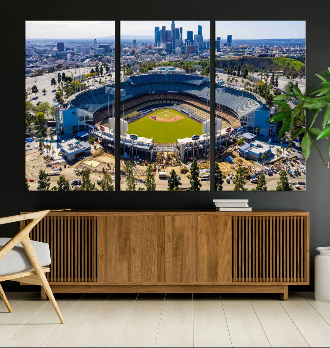 Aerial view of Dodger Stadium, home to the Los Angeles Dodgers, set against a city skyline and featured as a striking wall art piece across three framed panels, offering a gallery-quality finish.