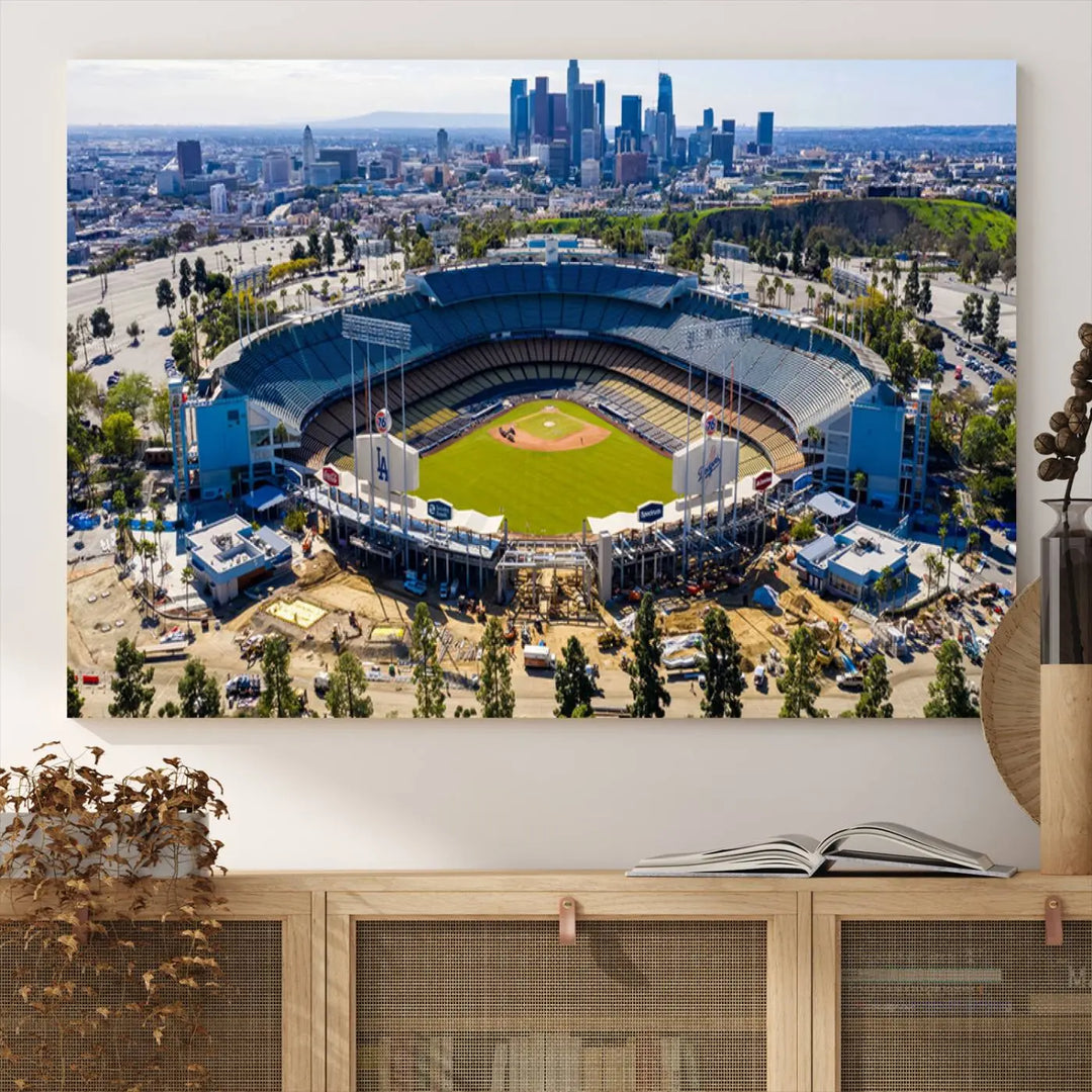 Aerial view of Dodger Stadium, home to the Los Angeles Dodgers, set against a city skyline and featured as a striking wall art piece across three framed panels, offering a gallery-quality finish.