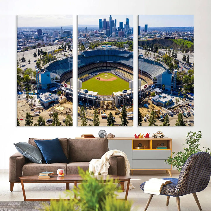 Aerial view of Dodger Stadium, home to the Los Angeles Dodgers, set against a city skyline and featured as a striking wall art piece across three framed panels, offering a gallery-quality finish.