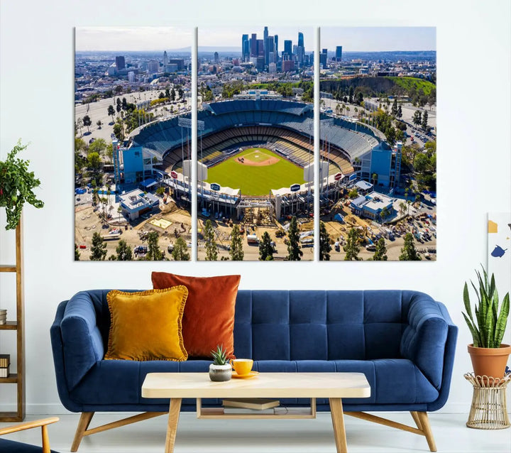 Aerial view of Dodger Stadium, home to the Los Angeles Dodgers, set against a city skyline and featured as a striking wall art piece across three framed panels, offering a gallery-quality finish.