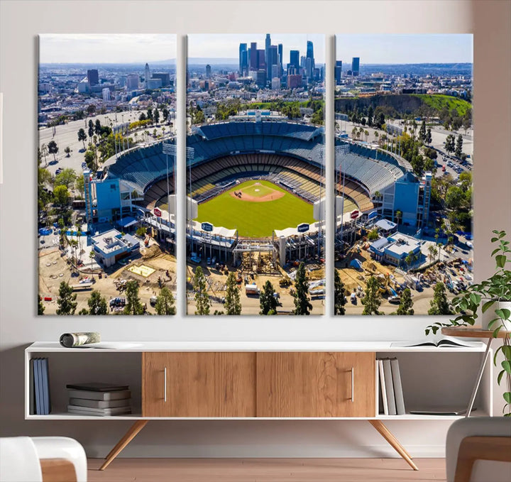 Aerial view of Dodger Stadium, home to the Los Angeles Dodgers, set against a city skyline and featured as a striking wall art piece across three framed panels, offering a gallery-quality finish.