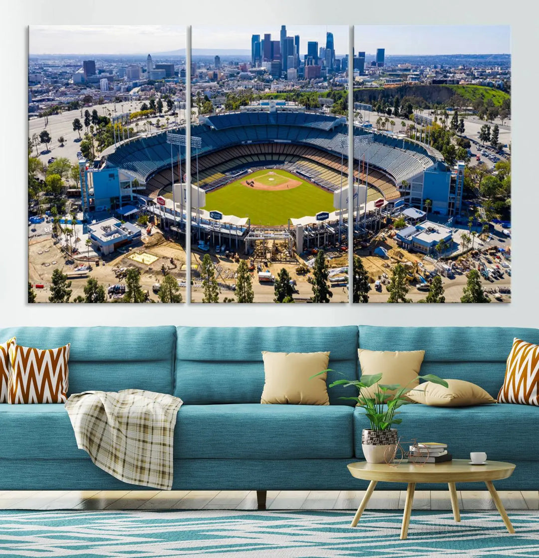 Aerial view of Dodger Stadium, home to the Los Angeles Dodgers, set against a city skyline and featured as a striking wall art piece across three framed panels, offering a gallery-quality finish.